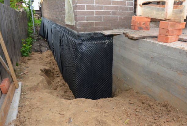 SJ Waterproofing Pros technician performing targeted Sump Pump Installation assessment in Marion, AL